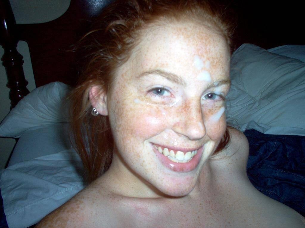 Skinny girl with cum on her face